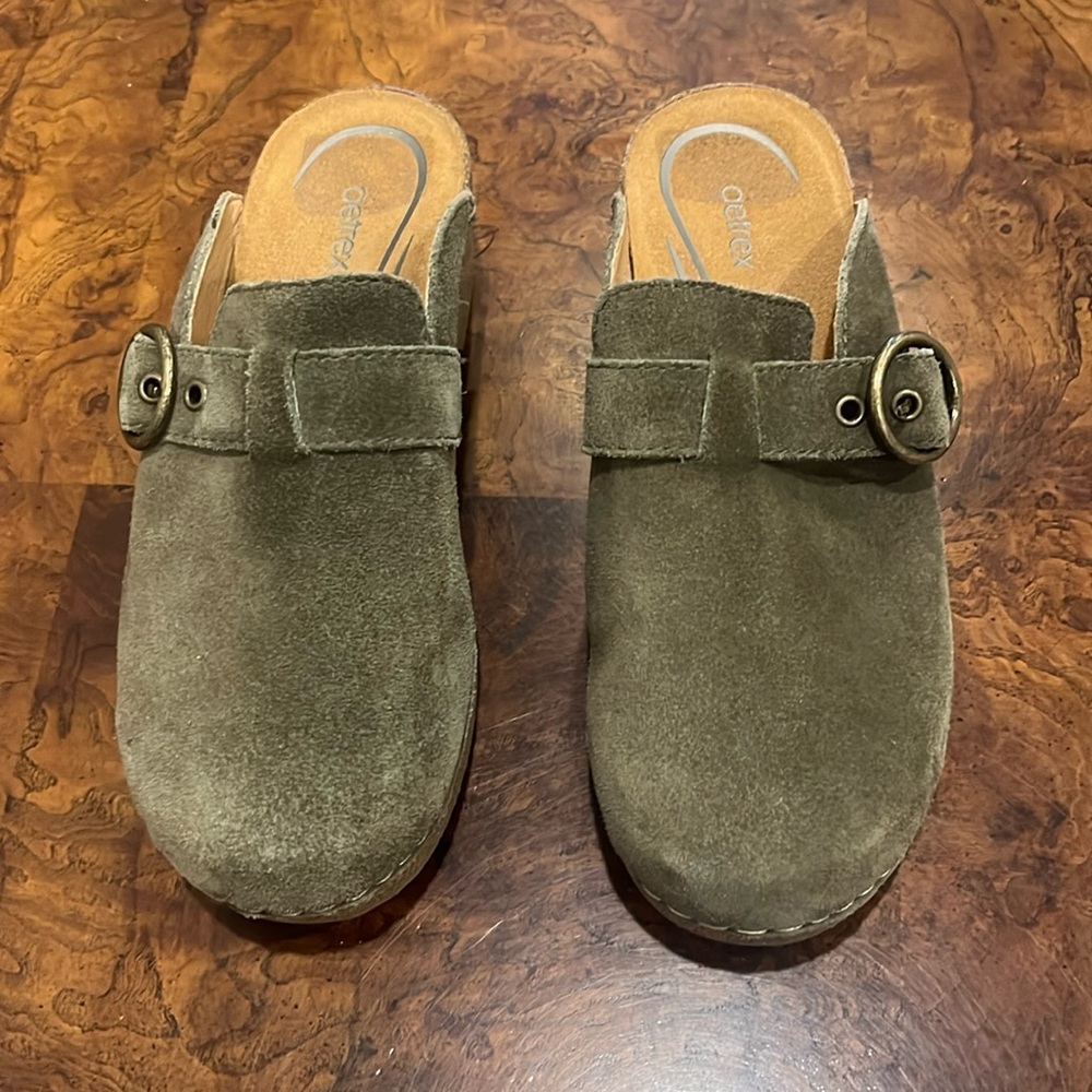 Olive suede Aetrex clogs.
